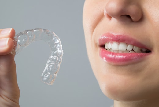 Invisible braces pros and cons