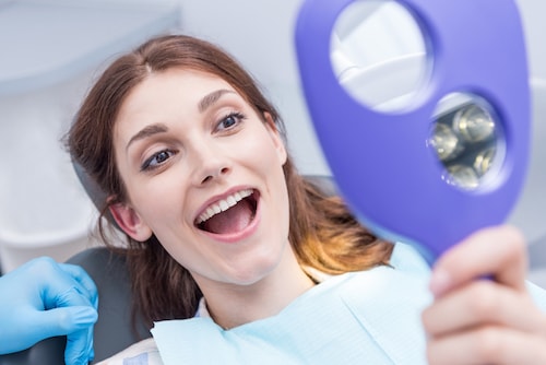 What are the types of cosmetic dentistry treatments